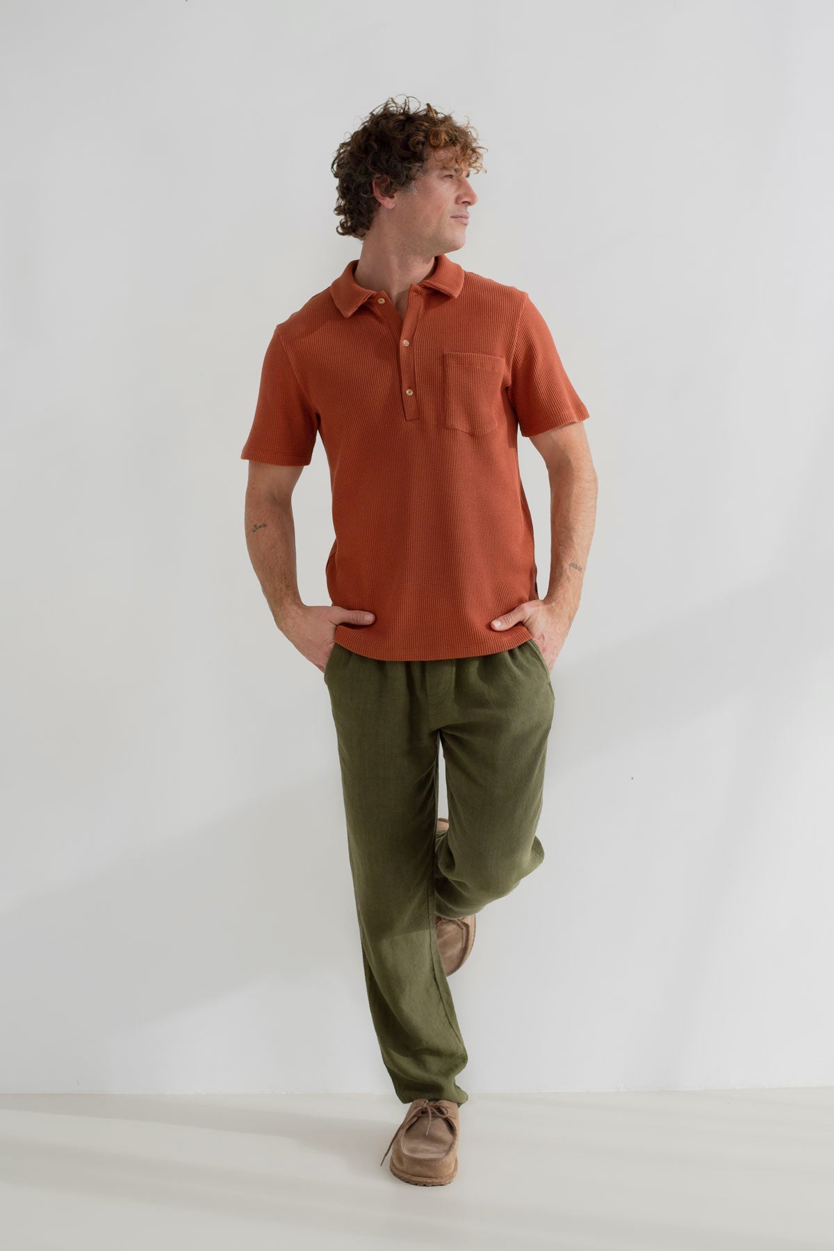 Coconut shell classic polo shirt men green pants full body view front