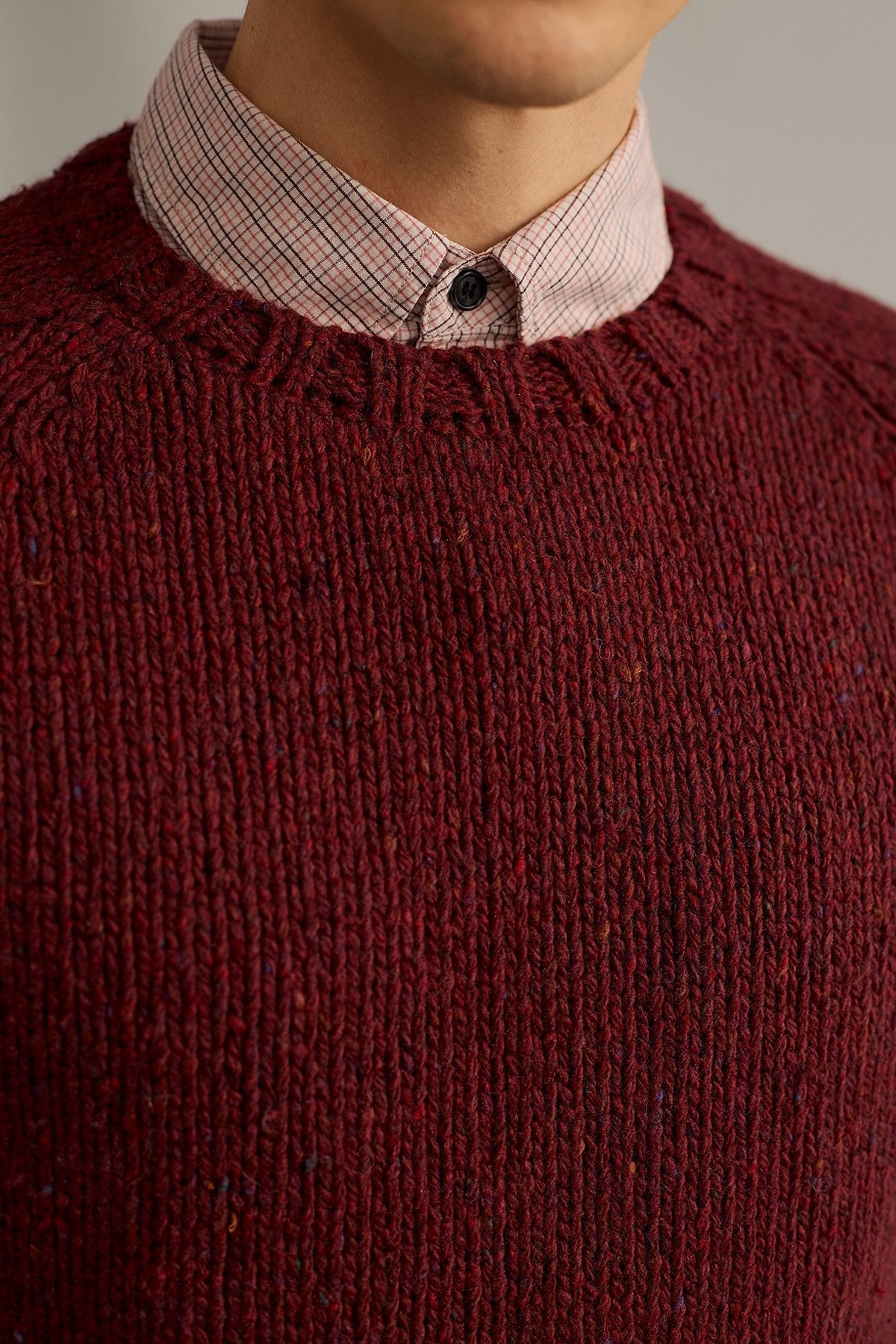 red knit flecked with colourful neps