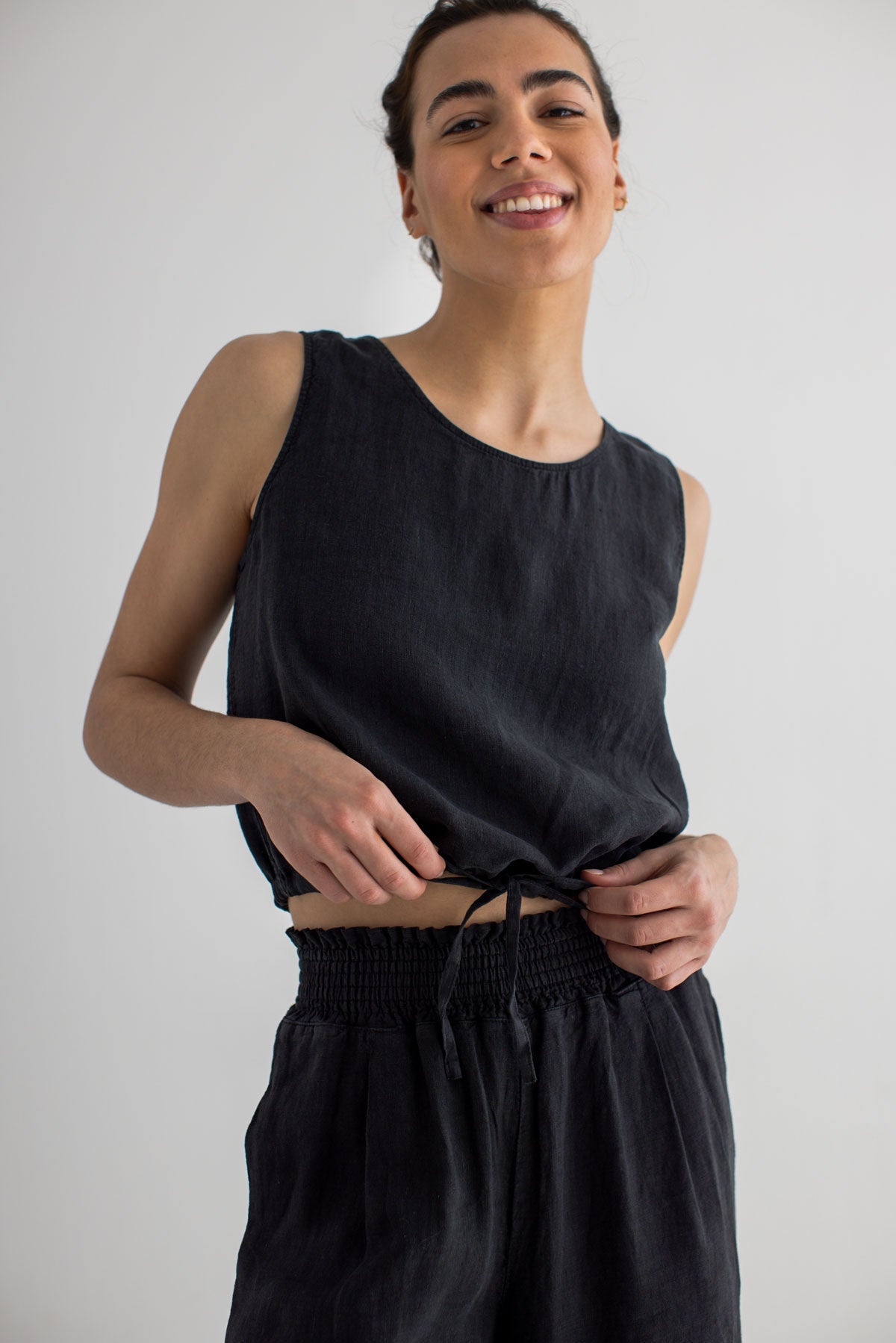 Black Sleeveless linen shirt women black pants wear view front