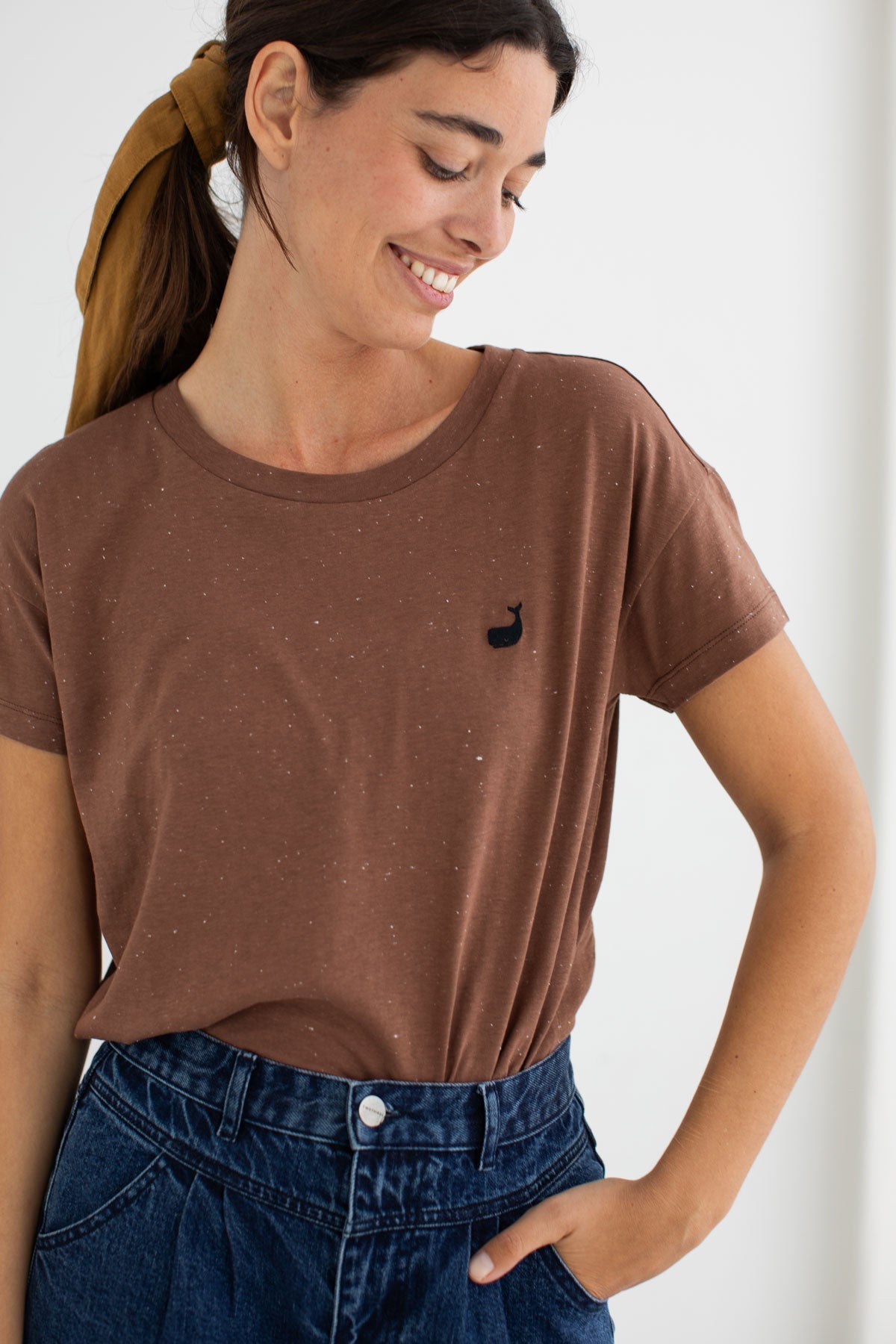 Brown tshirt navy jeans women wear view front