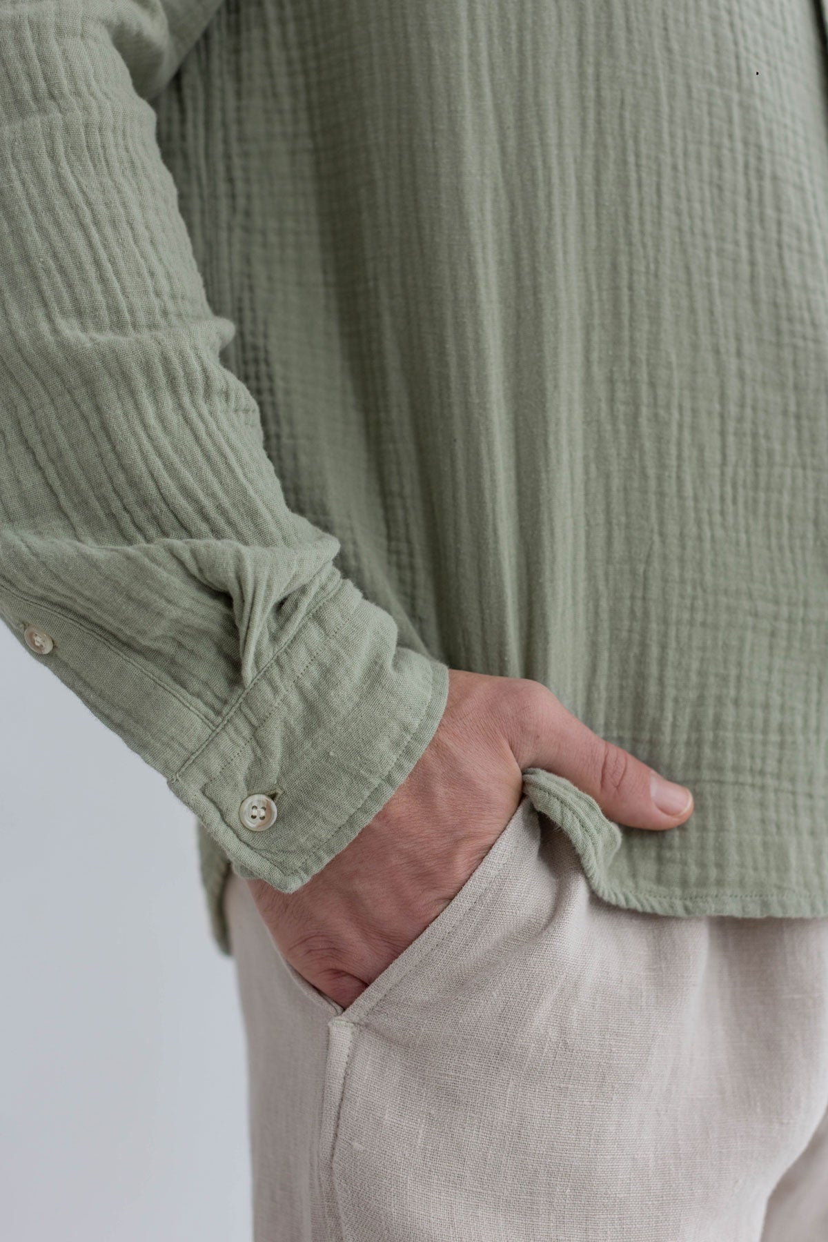 Light green muslin shirt men light pants detail front