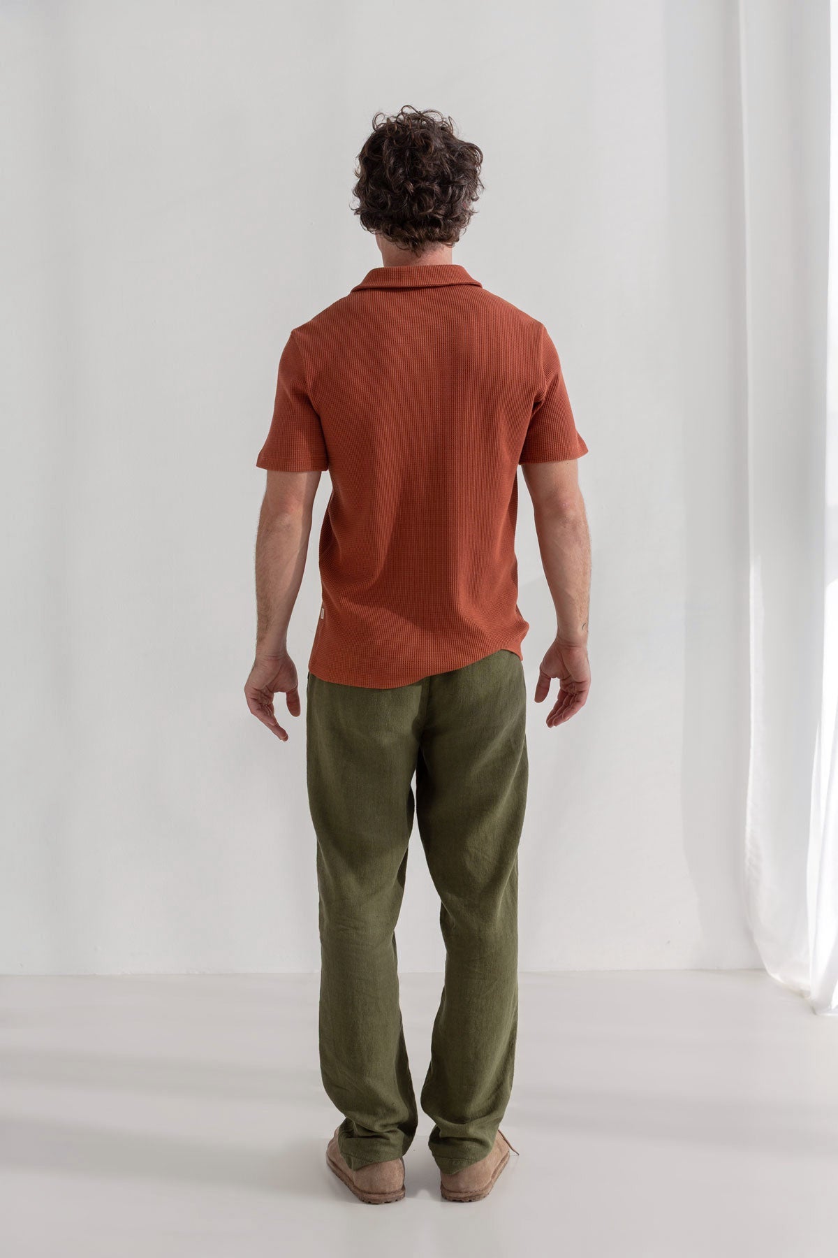 Coconut shell classic polo shirt men green pants full body view back