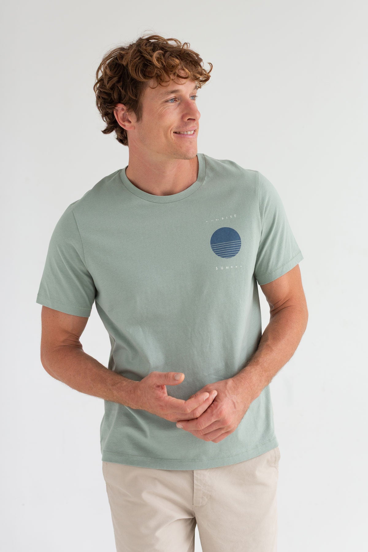 Orient green roundneck t-shirt men light pants wear view front 