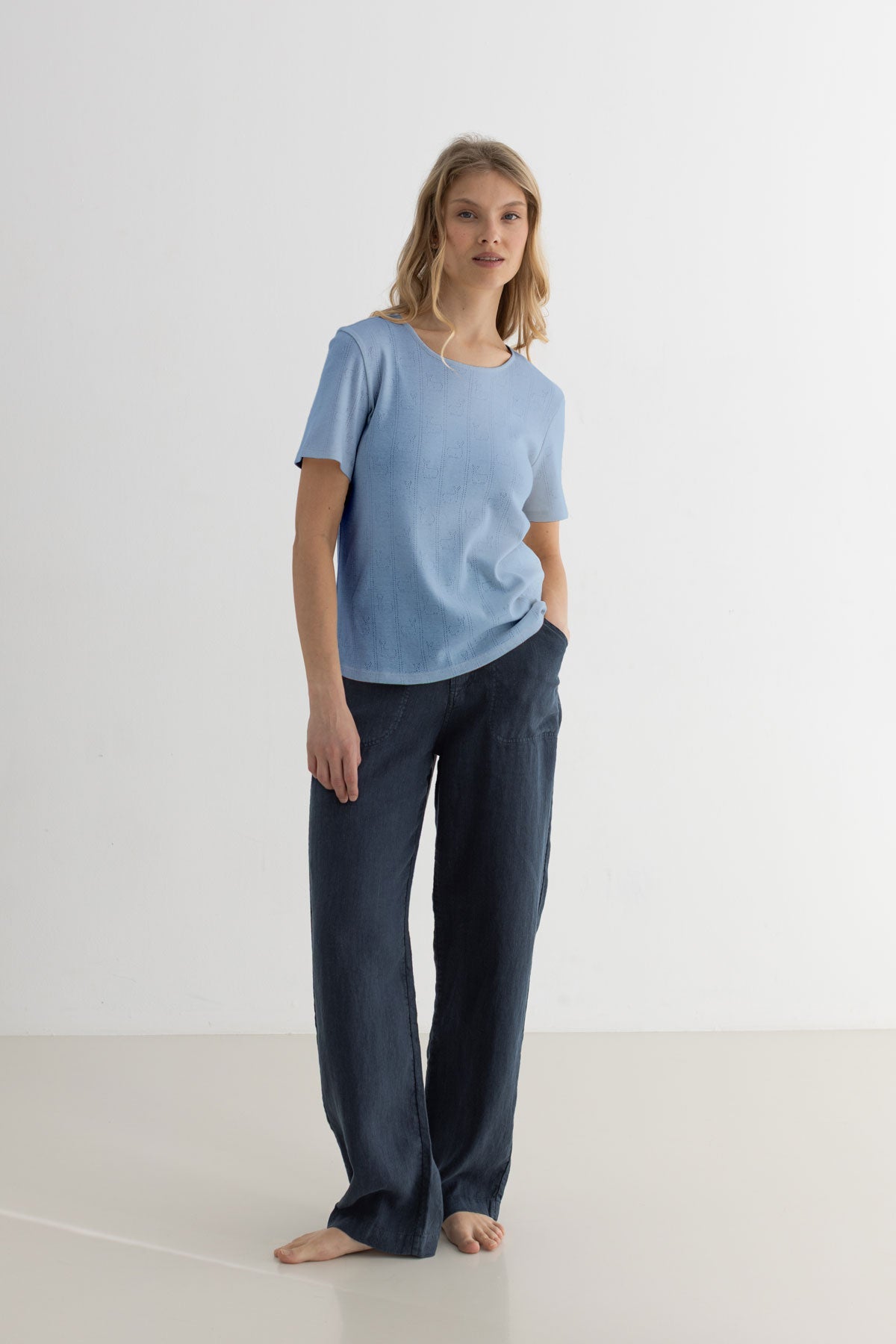 Denim blue top women navy pants full body view front