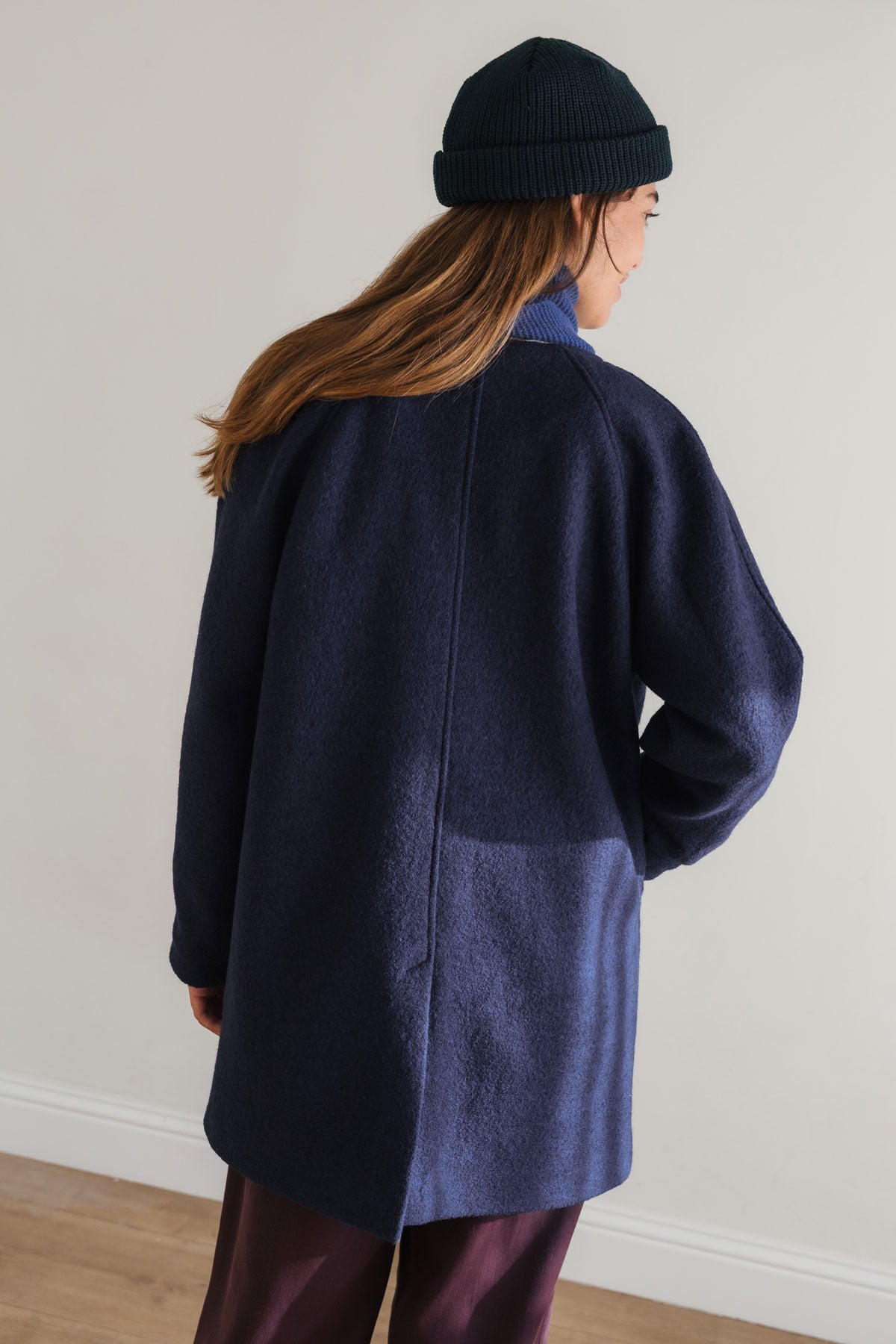 Minimalist navy wool overcoat